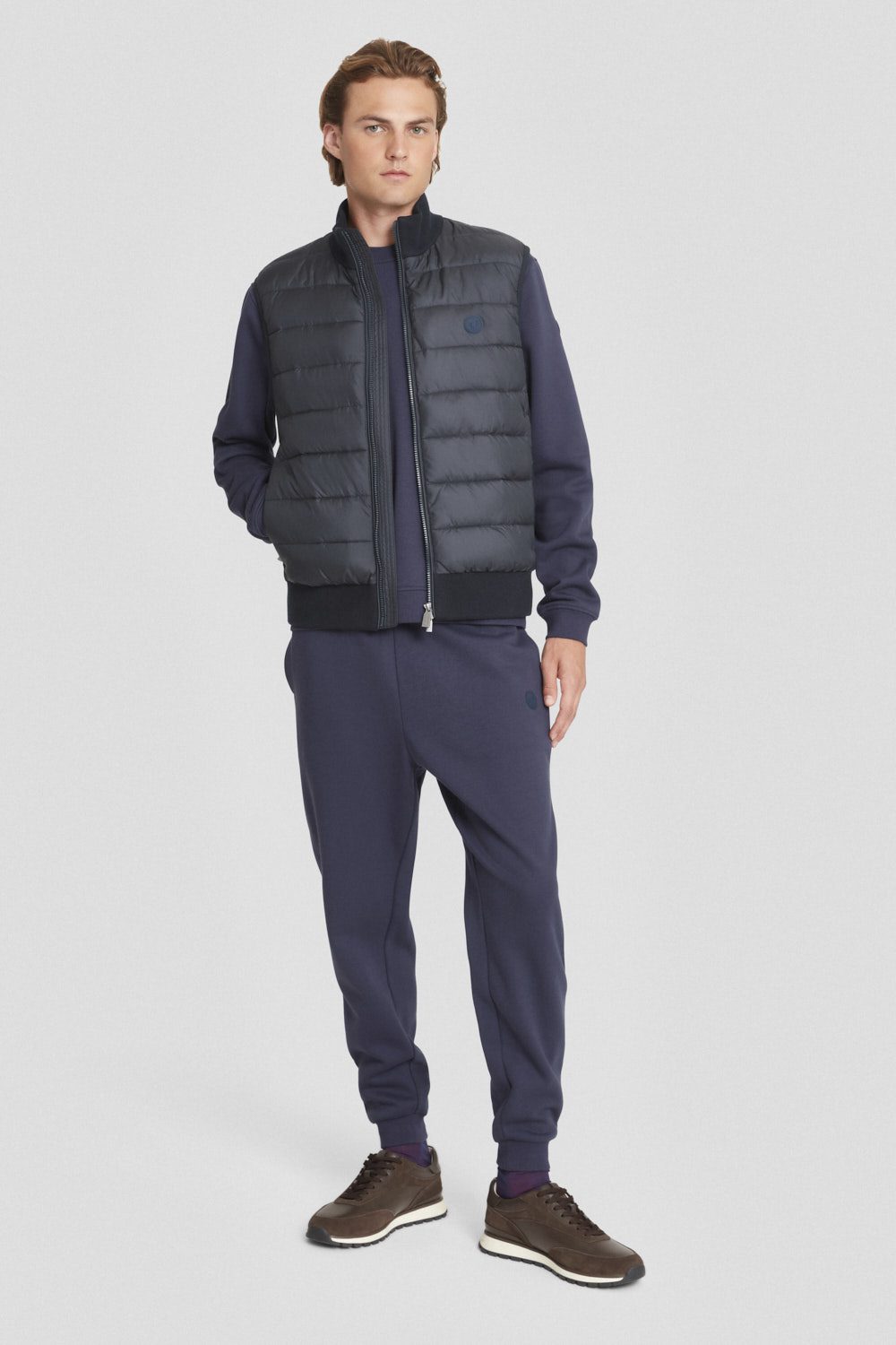 Gilet imbottito blu con dettagli in maglia