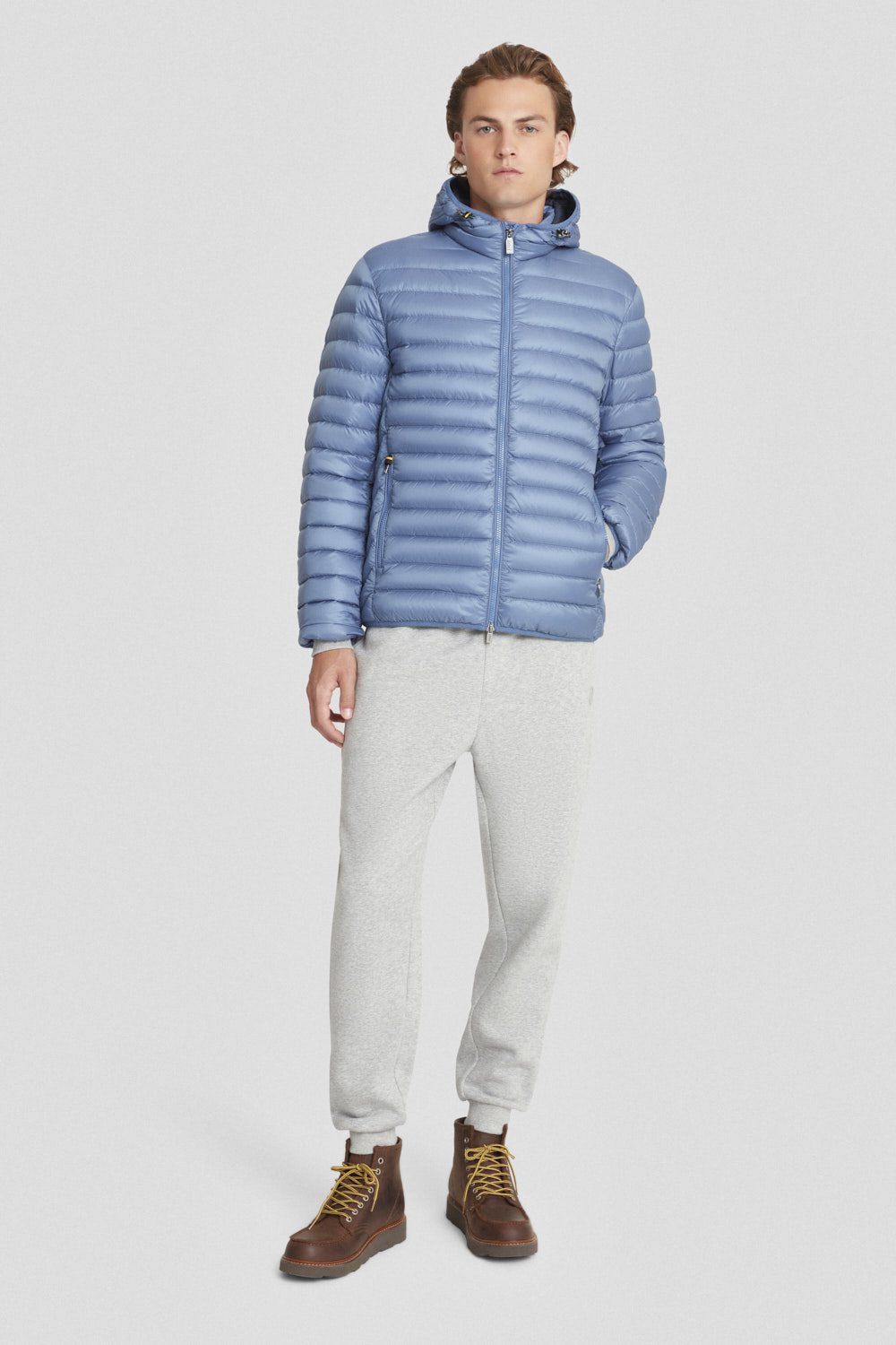 Piumino leggero azzurro con cappuccio