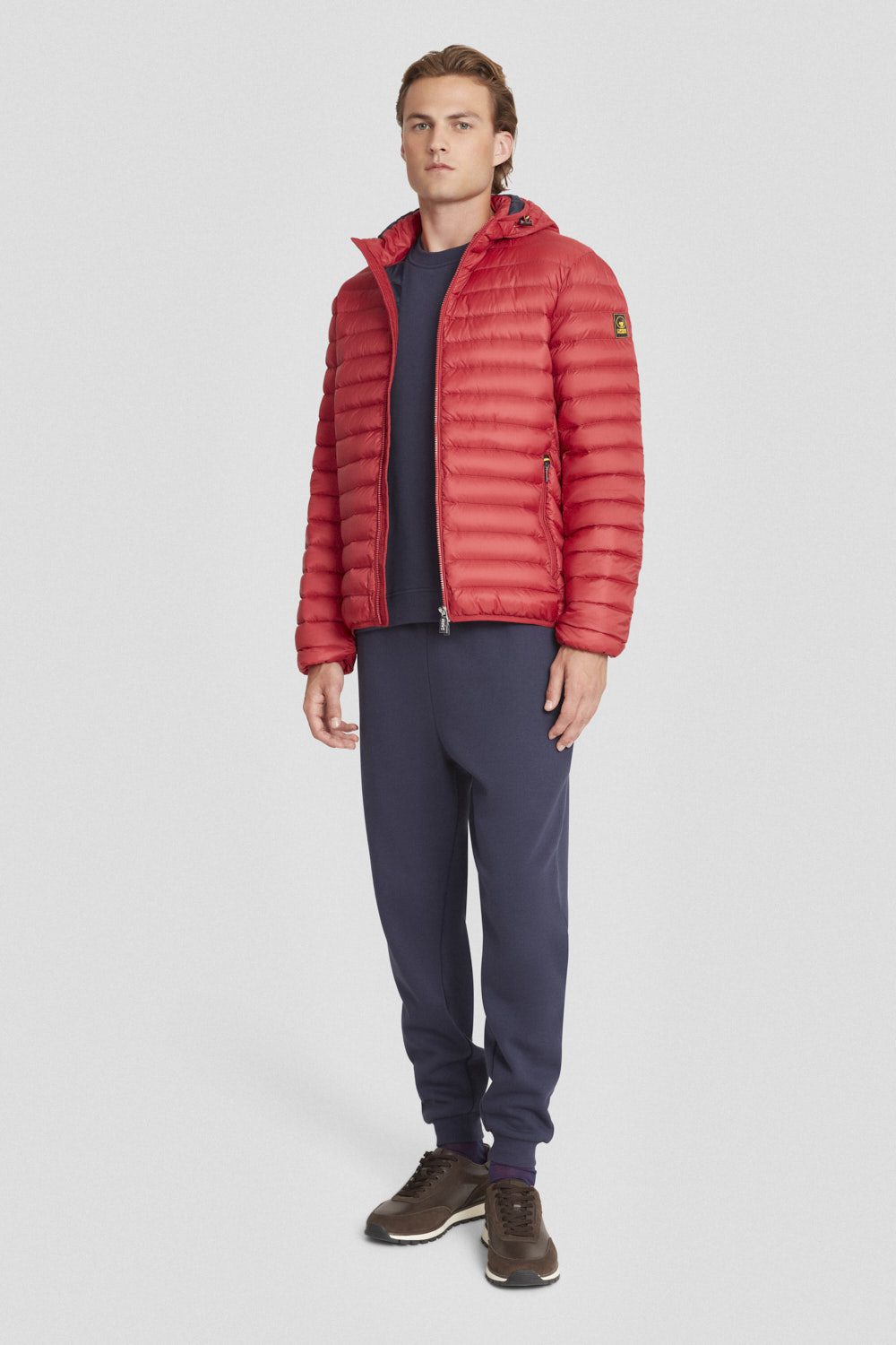 Piumino leggero rosso con cappuccio