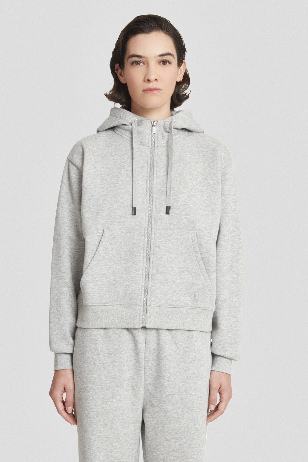 Felpa sportiva grigia con zip