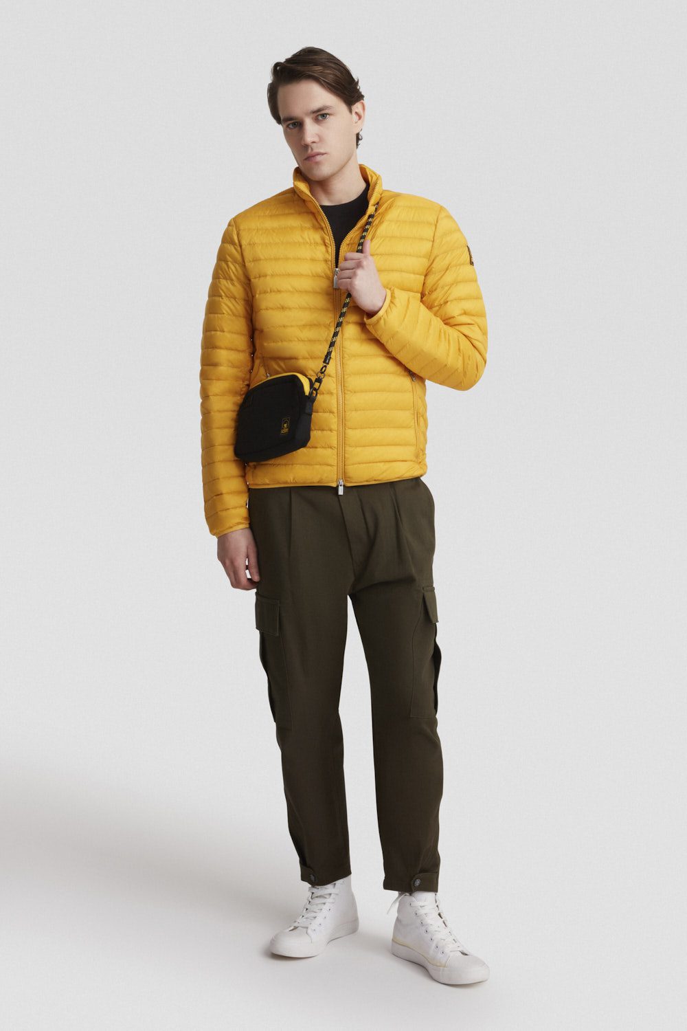 Piumino giallo leggero con zip in vera piuma