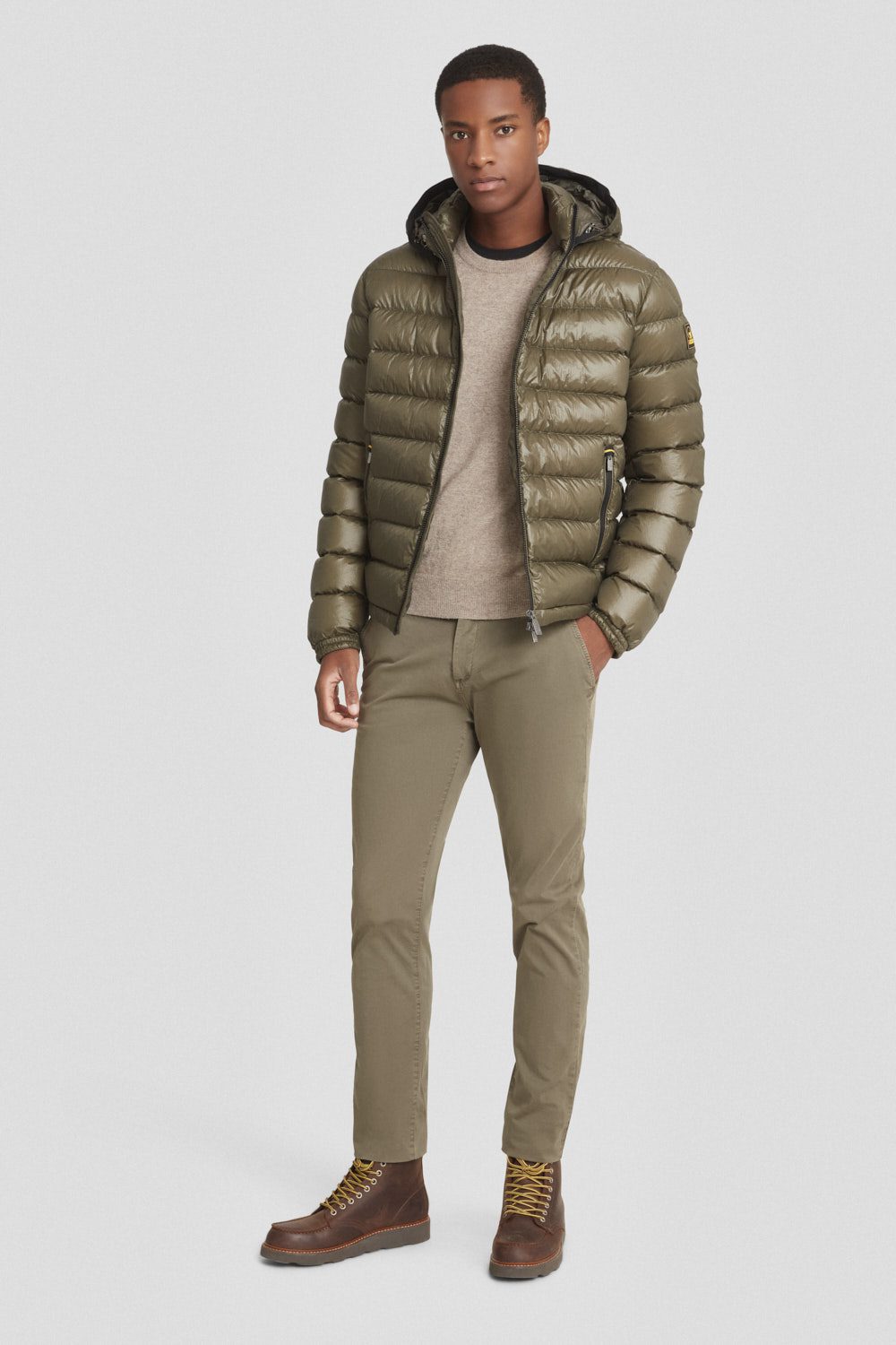 Piumino corto verde con cappuccio staccabile