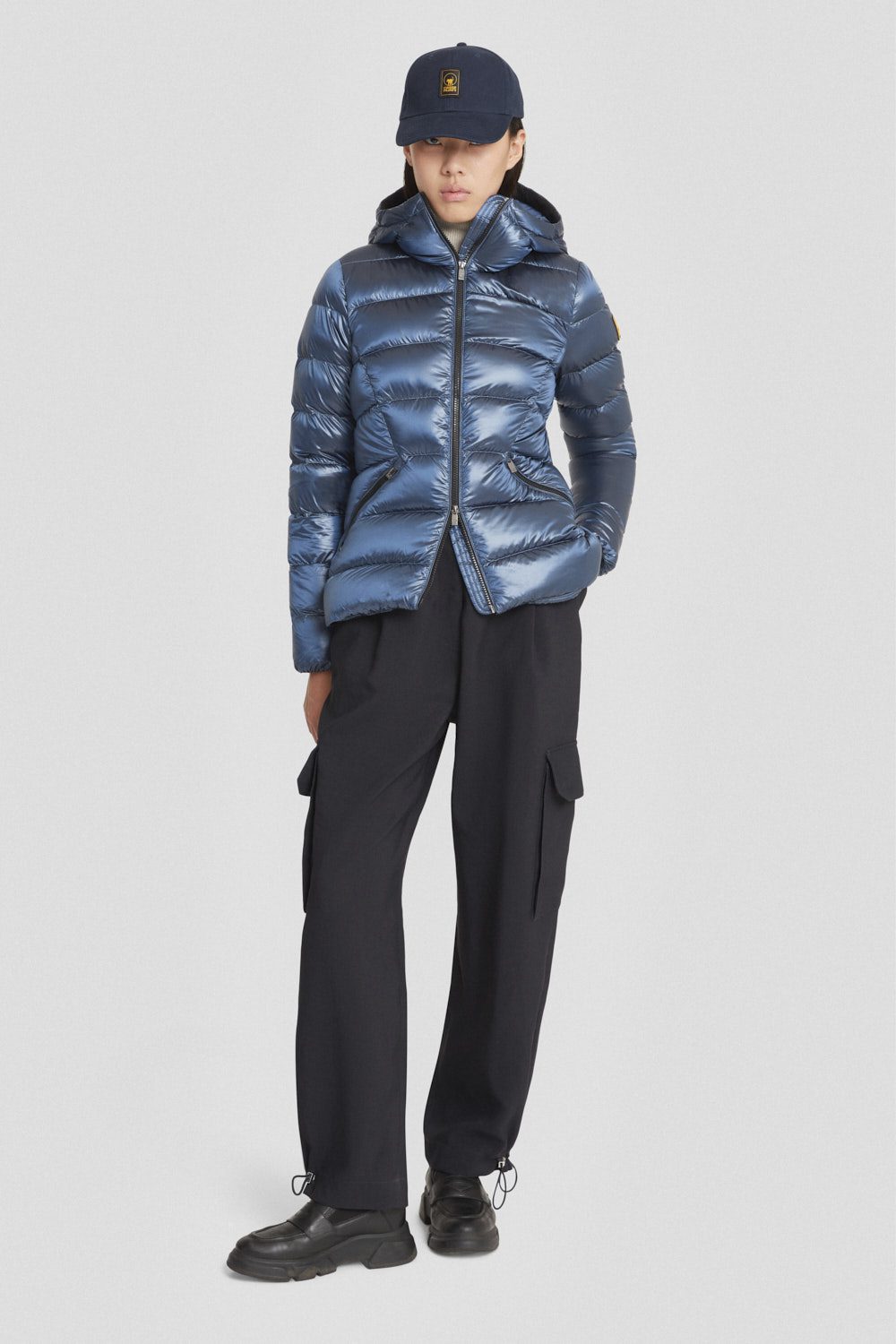 Piumino azzurro con cappuccio