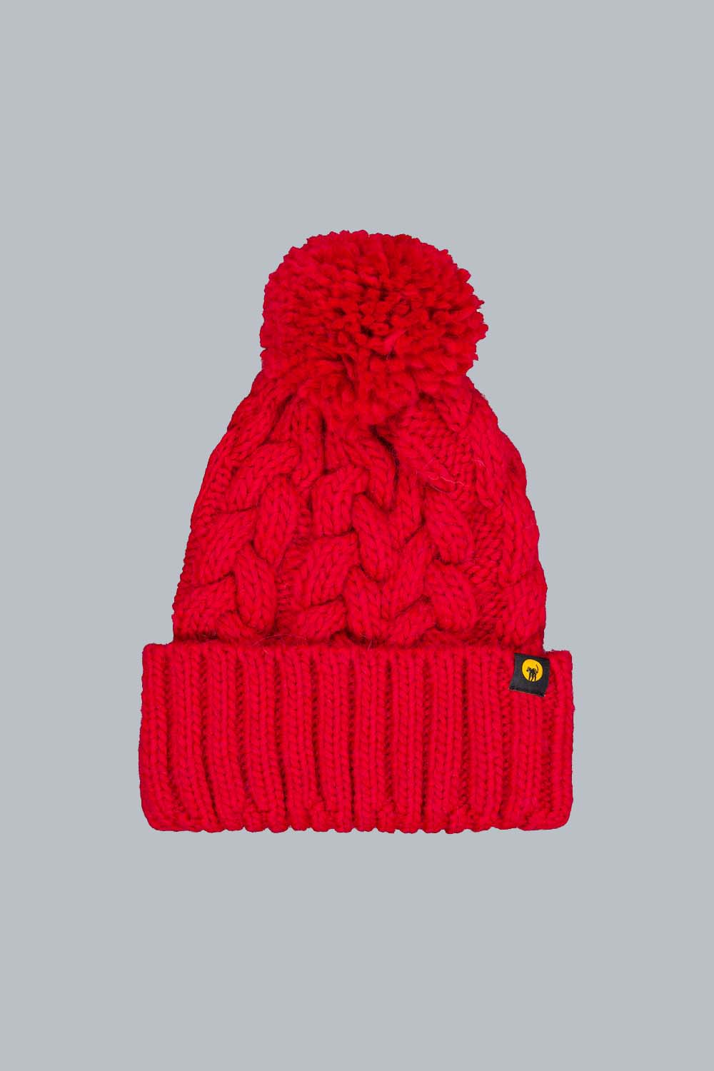 SCILLY -  CAPPELLO IN MAGLIA A TRECCE ROSSO CON POMPON