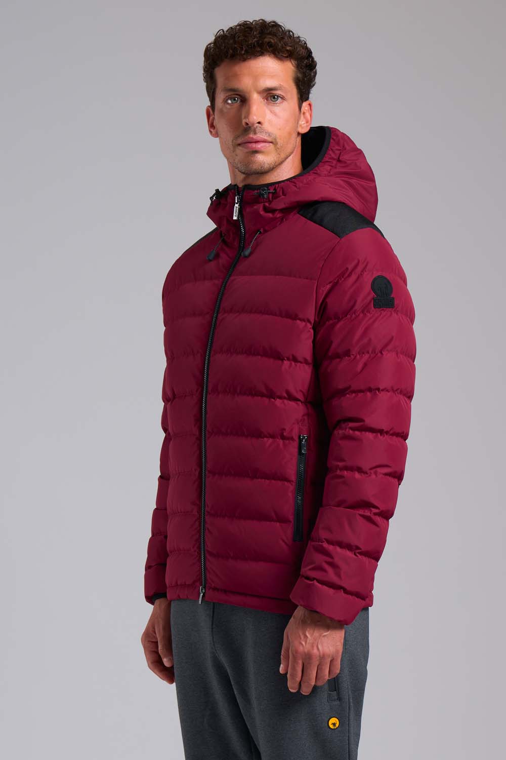 STEVENSON – Piumino corto rosso con cappuccio imbottito in vera piuma